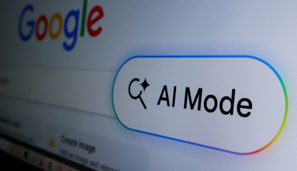 A computer screen displays the Google logo and a highlighted “AI Mode” button